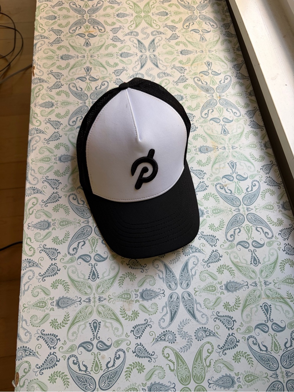 Peloton Black and White Trucker Cap with Raised Logo